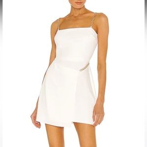 Amanda Uprichard white mini dress with gold chains